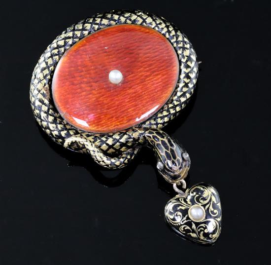 A Victorian gold, two colour enamel and seed pearl set serpent drop brooch, overall drop 62mm.